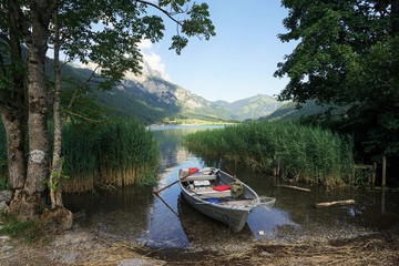 Fishing boat on a lake in the Tyrolean Alps