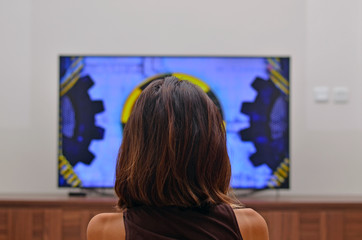 Fototapeta na wymiar Women watching television