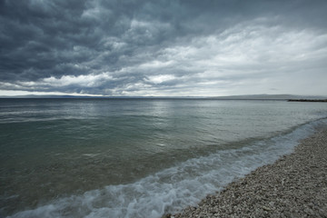 View from the shore on the incoming storm