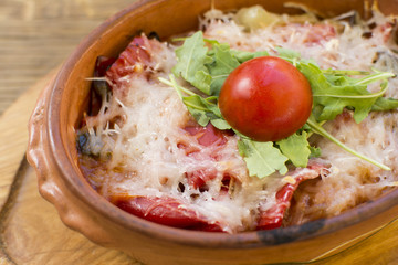 Roasted chicken breast, served with fried potatoes and cooked vegetables. Warm cheese topping with the touch of seasoning. Beautifully served at the restaurant.