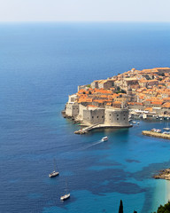 Dubrovnik walls at blue Adriatic sea aerial