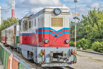 Retro style locomotive on countryside railway