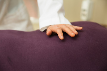 Elderly woman being massaged