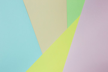 Obraz premium Abstract geometric paper background. Green, yellow, pink, orange, blue trend colors. Concept or idea picture use for copy space