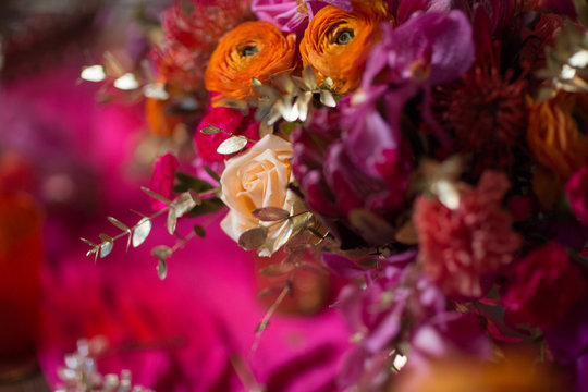 flowers in a vase in a pink and purple background © agaltsov