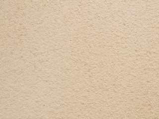 The wall of sand texture background.
