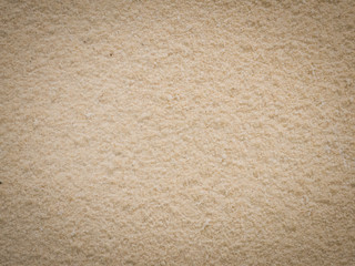 Fototapeta na wymiar The wall of sand texture background.