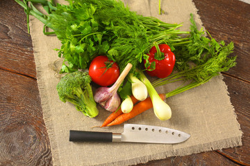 Fresh vegetables on a wooden table. Healthy food. Diet