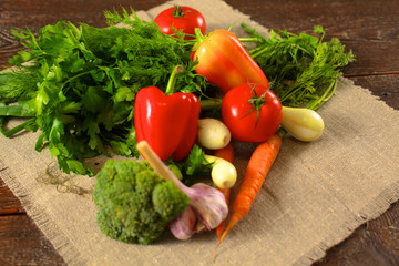 Fresh vegetables on a wooden table. Healthy food. Diet