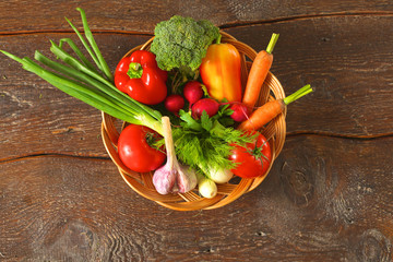 Fresh vegetables on a wooden table. Healthy food. Diet