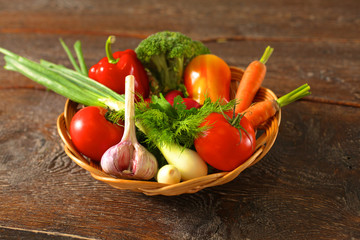 Fresh vegetables on a wooden table. Healthy food. Diet