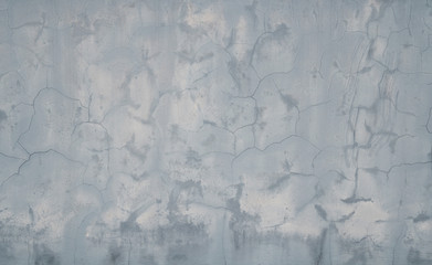 Old grey concrete wall pale and cracked