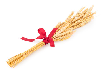 Ears of wheat tied with red ribbon