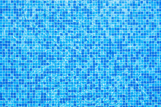 Blurred blue mosaic background.