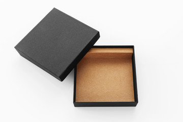 Black box product packaging with lid on white background