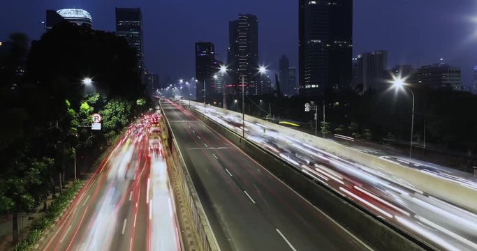 
Time lapse footage of rush hour traffic on the highway from dusk to night in Jakarta, Indonesia. Shot in 4k resolution
