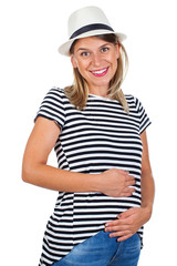 Young casual mother in first trimester - isolated