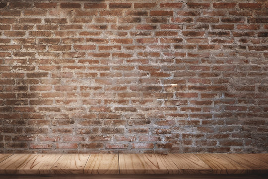 Fototapeta Mock up wooden table with white brick wall. For product display montage.
