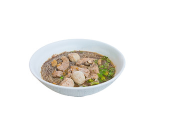 noodle meat ball and pig piece in bowl on table with broth intense. top view isolated oover  white background and clipping path