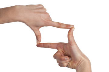 Woman hands making frame gesture isolated on white background with copy space