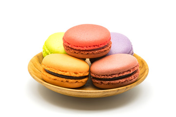Macarons in wooden plate