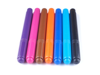 Markers on white background