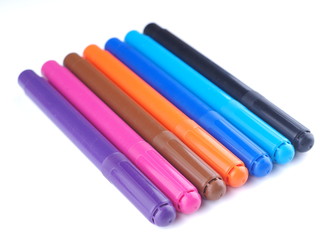 Markers on white background