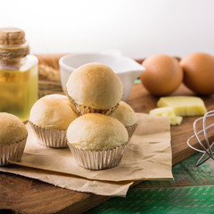 Homemade bread, milk and ripe ears of rye