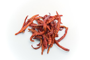 Dried chilies on a white background