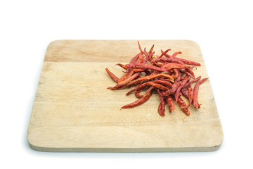 Dried chilies on a white background