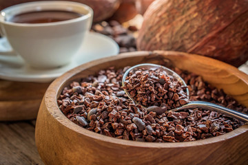 Cup of hot chocolate with cocoa powder,