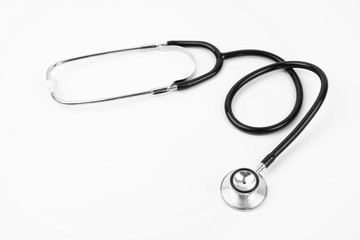 Close up view of black stethoscope on white isolate background