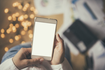 Girl with a smart phone with blank display