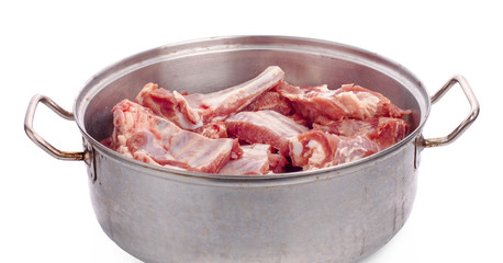 Raw spare ribs on white background