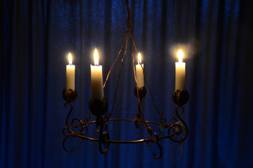 Copper advent wreath with lights.