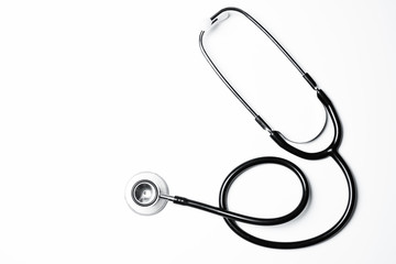 Close up view of black stethoscope on white isolate background