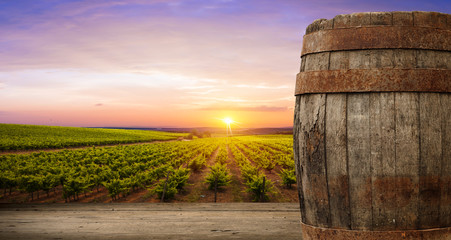 Obraz premium background of barrel and worn old table wood
