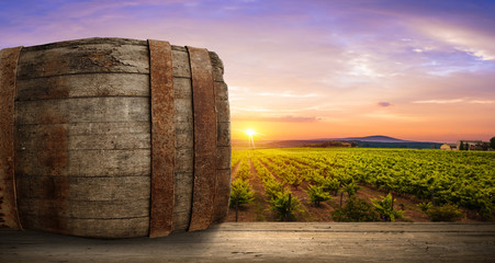 Obraz premium background of barrel and worn old table wood