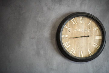 antique Wall clock on concrete wall