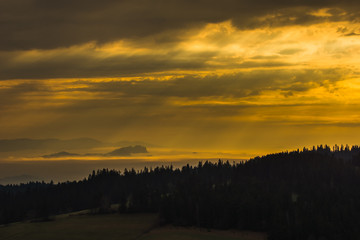 Sunrise and foggy morning over Pieniny mountains from Czarna Gora, Zakopane, Poland