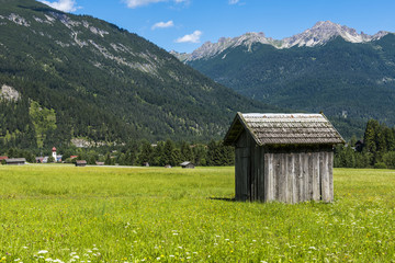 Fototapeta premium Cabin in Meadow Stanzach