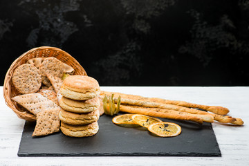 classical Italian fresh delicious homemade raisin scones, crackers and Grissini bread sticks....