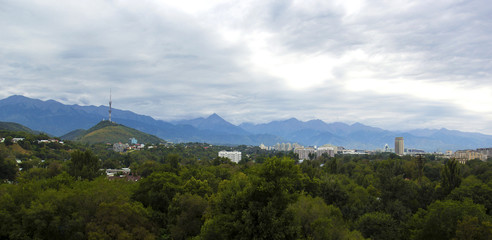 Panoramic view of Communication tower on Kok Tobe hill and Kazakhstan Hotel, Almaty