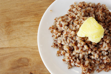 buckwheat porridge in white ceramic plate