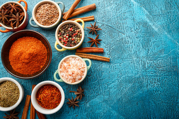 Spices and condiments in small bowls