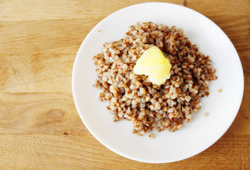 buckwheat porridge in white ceramic plate