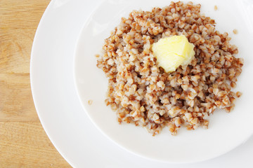 buckwheat porridge in white ceramic plate