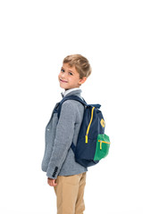 smiling schoolboy with backpack