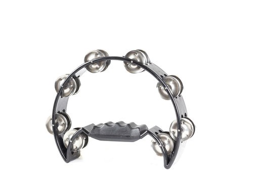 Black handheld tambourine on white background