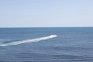 Naklejka premium Motorboat sailing on the black sea. 
